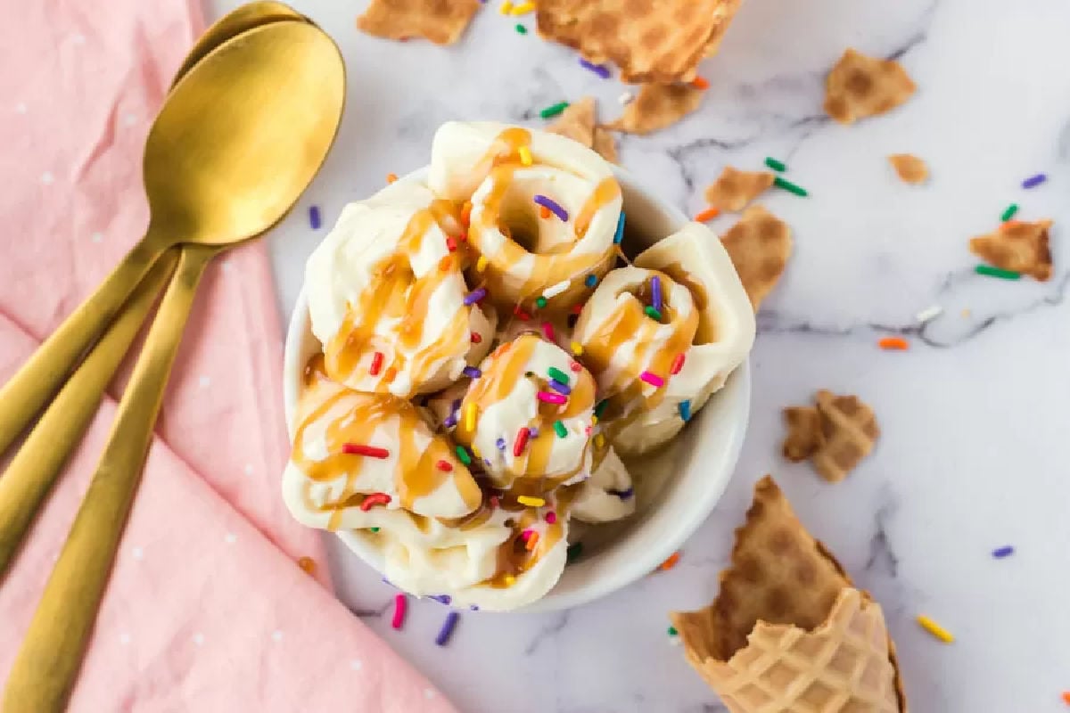 Rolled ice cream in a white bowl.