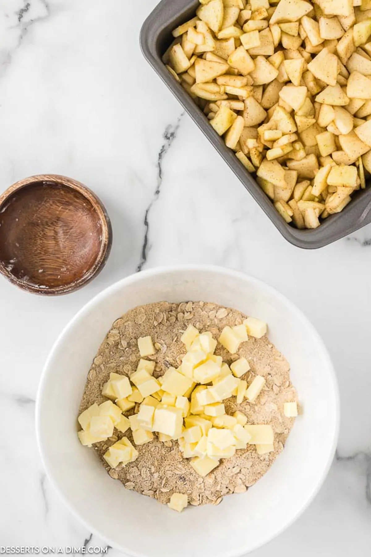 Butter cut into sugar mixture. 