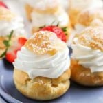 Cream Puffs served with berries.