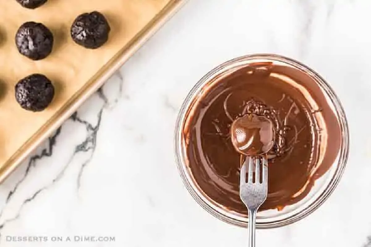 Oreo Balls dipped in melted chocolate. 