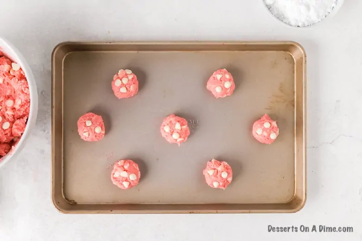 Dough balls on baking sheet. 