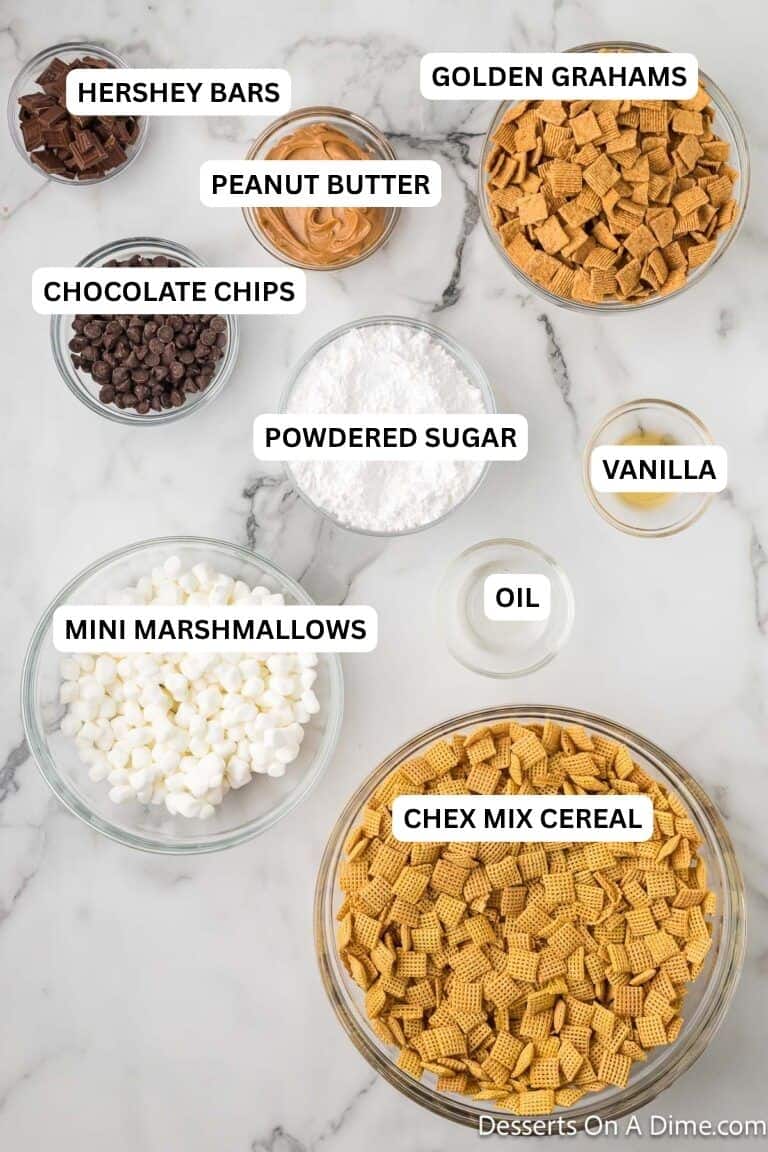 Ingredients for recipe: chex cereal, mini marshmallows, vanilla, powdered sugar, chocolate chips, oil, peanut butter, Hershey bars and golden grahams. 