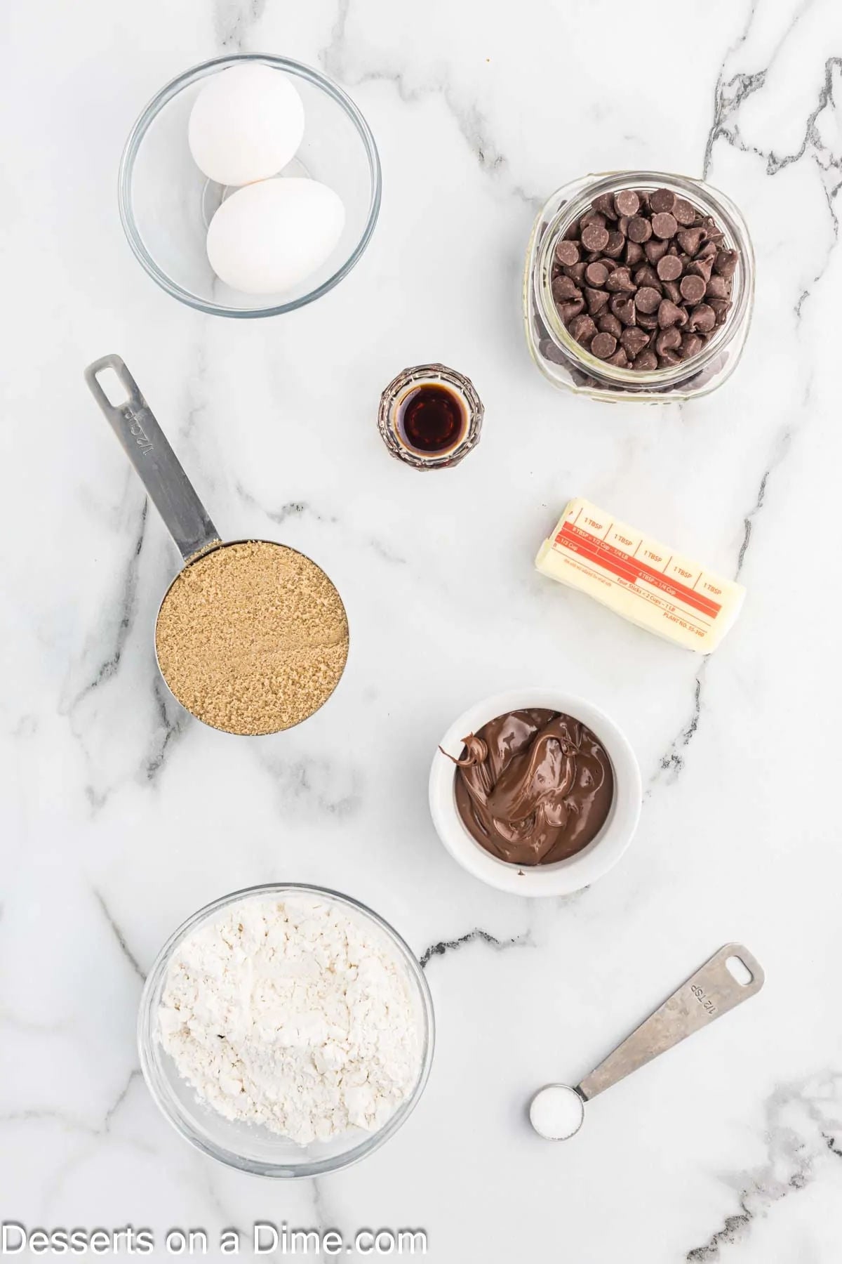 Ingredients for Nutella Brownies - butter, brown sugar, eggs, vanilla, nutella, flour, chocolate chips. 