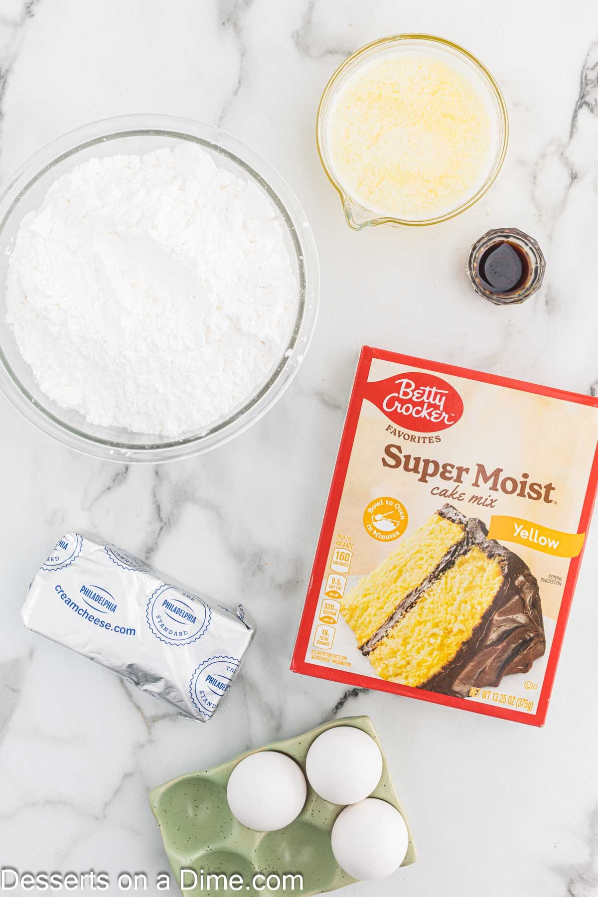 Ingredients for Ooey Gooey Bars - yellow cake mix, egg, butter, cream cheese, vanilla, powdered sugar.