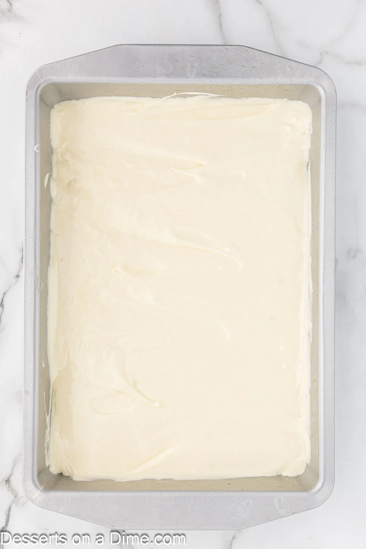 Filling spread over crust and ready to bake.