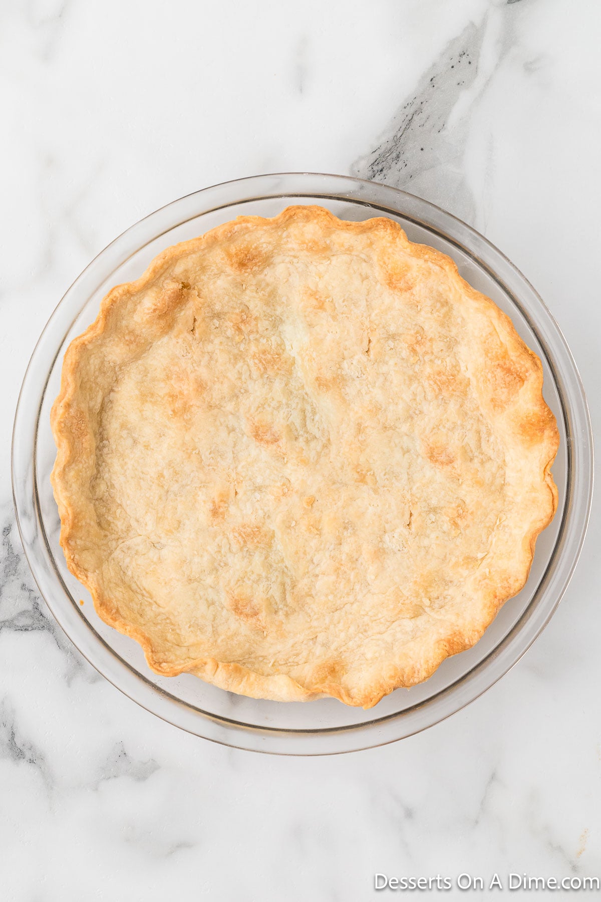 Pie crust baked until golden brown. 