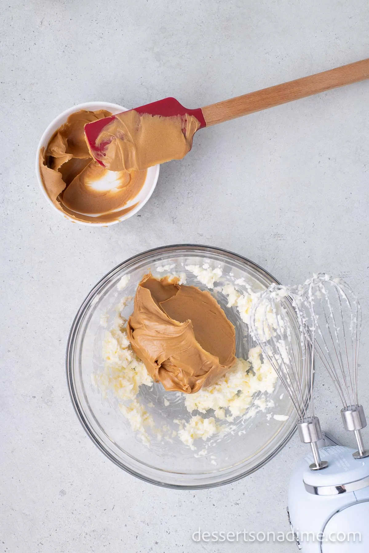 Powdered sugar and peanut butter in a bowl.