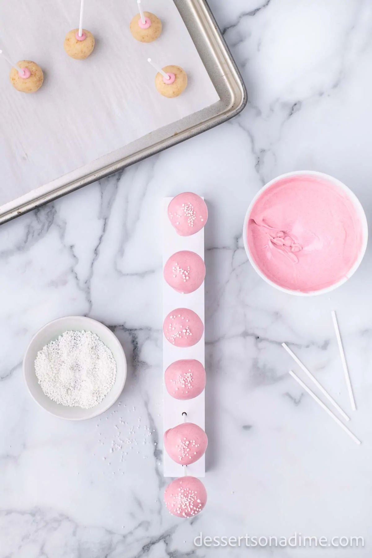 Cake pops placed in stand. 