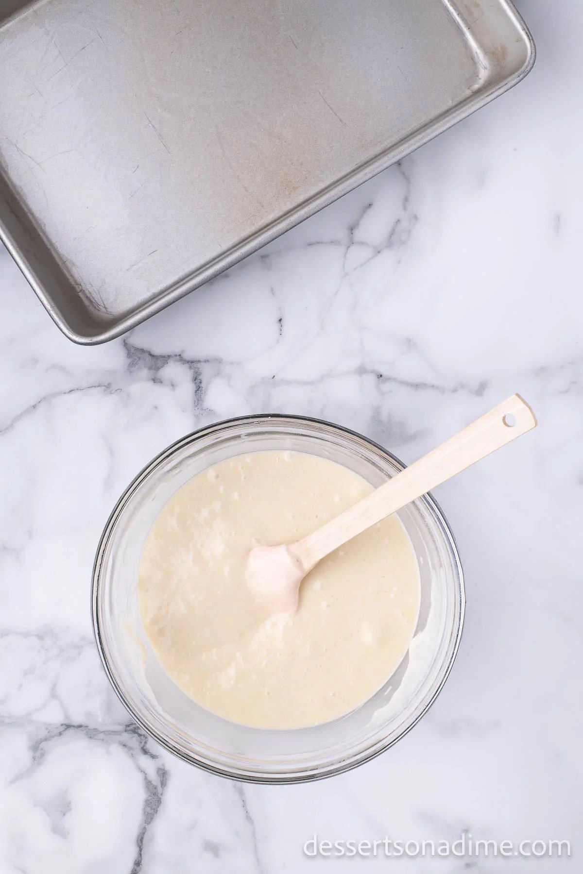 Cake batter in mixing bowl. 