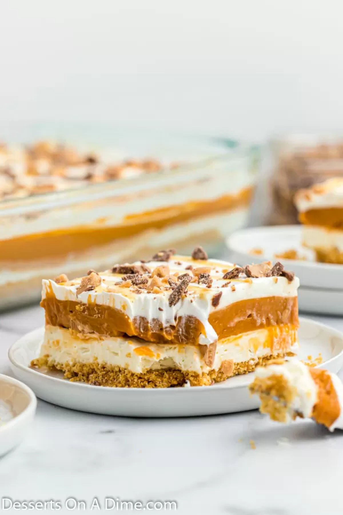 Butterscotch Delight cut into bars on a plate.