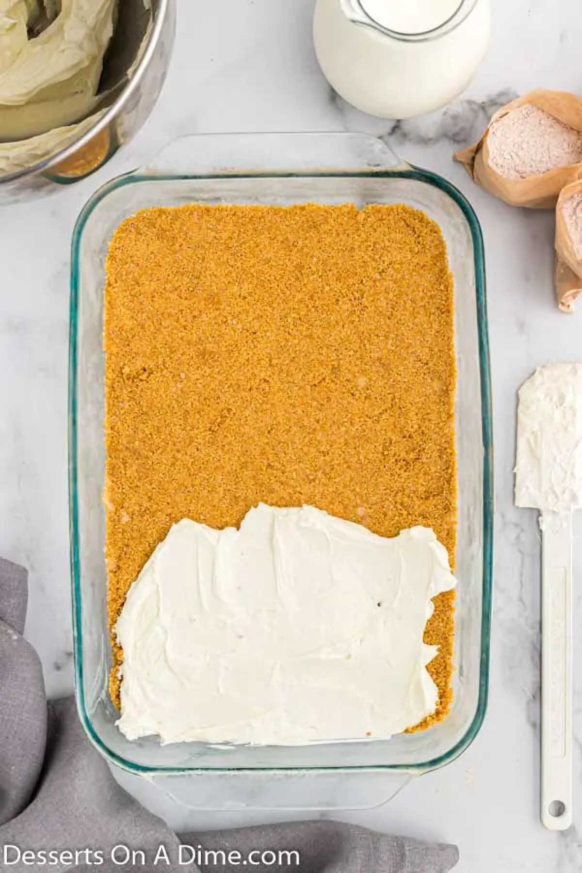 Cream cheese mixture spread on crust.