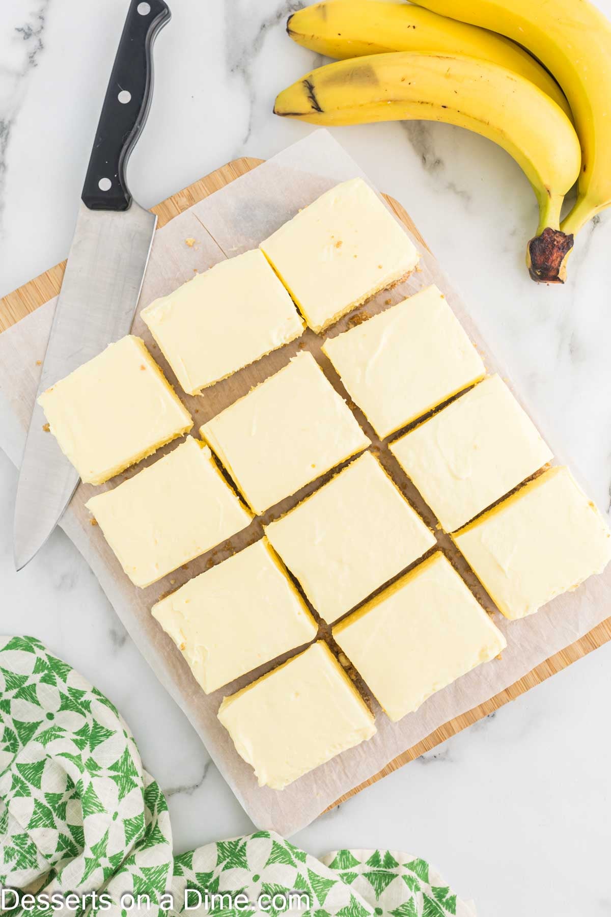 Banana Cream Cheesecake Bars cut into squares. 