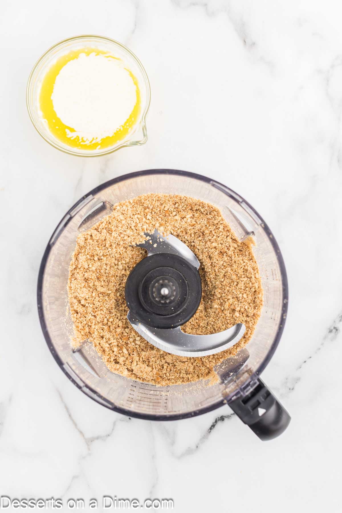 Vanilla wafers crushed in a food processor.