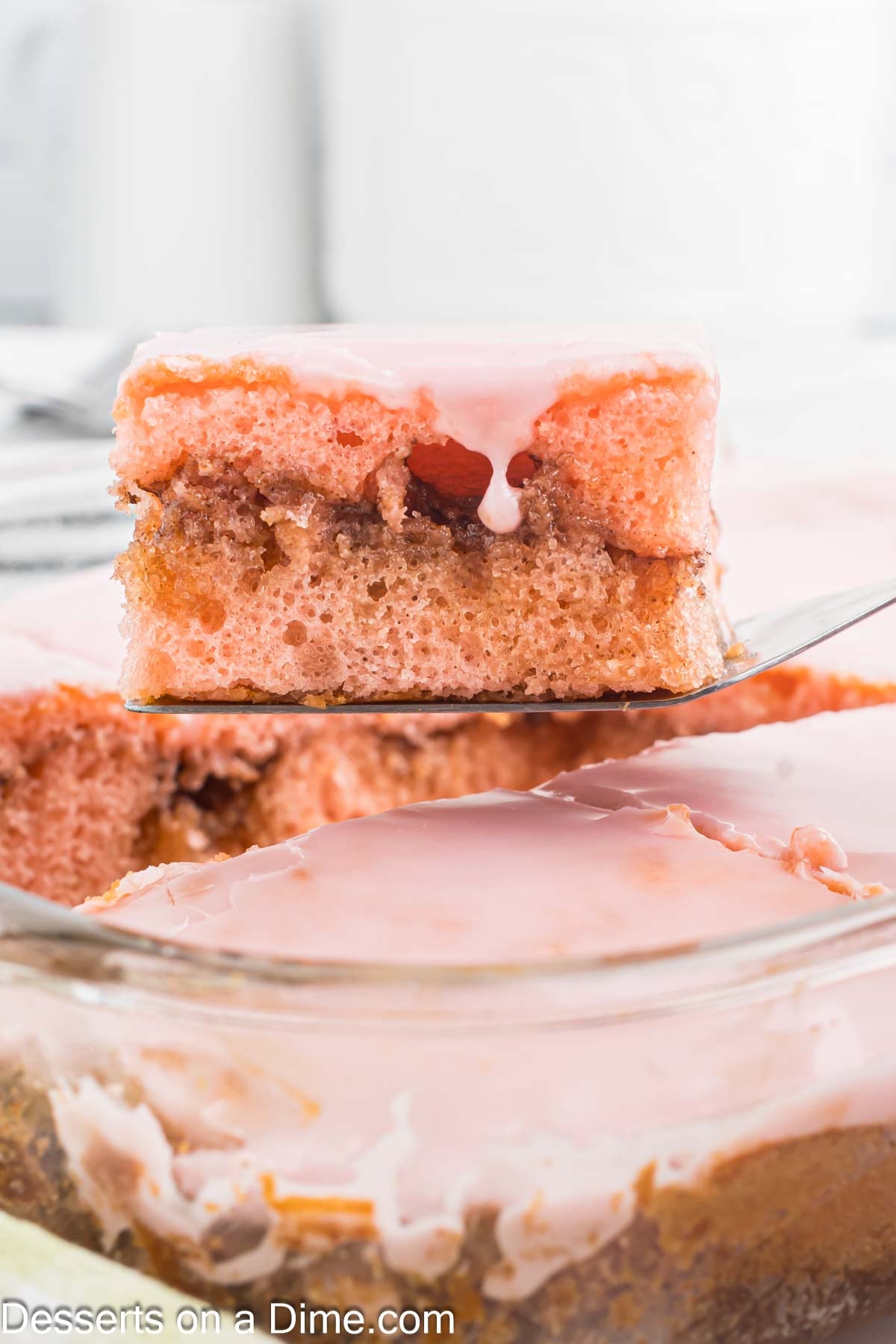 Strawberry cake being served. 