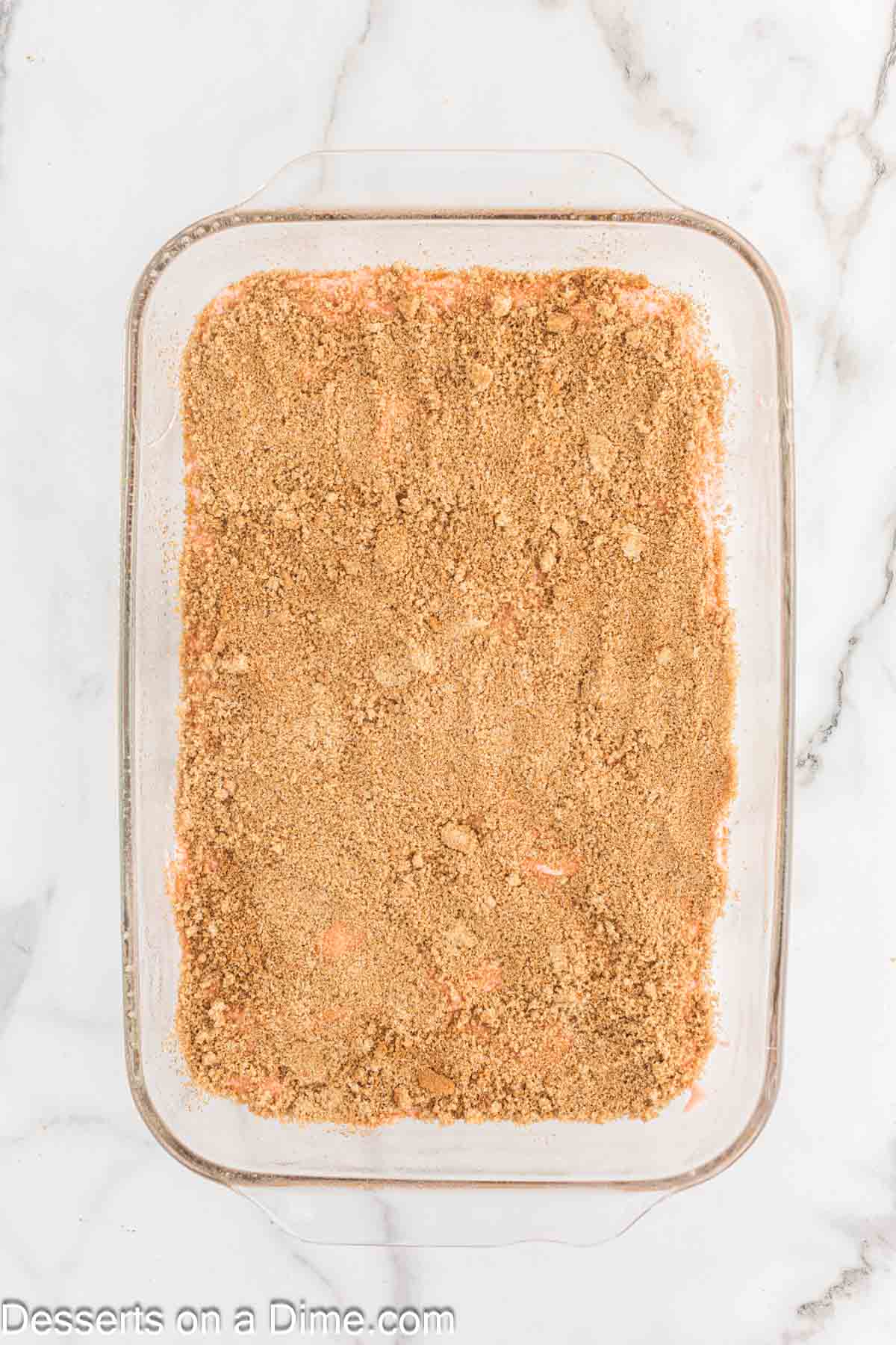 Brown sugar mixture sprinkled on top of batter in baking dish. 