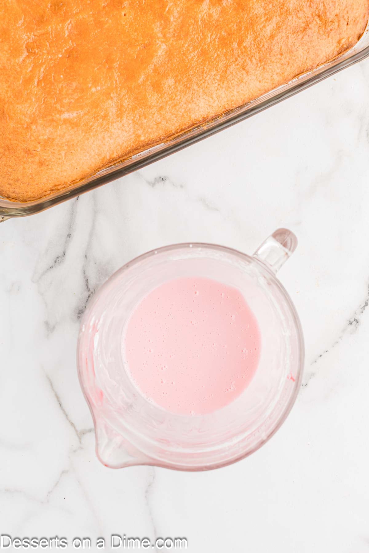 Mixture for icing in bowl. 