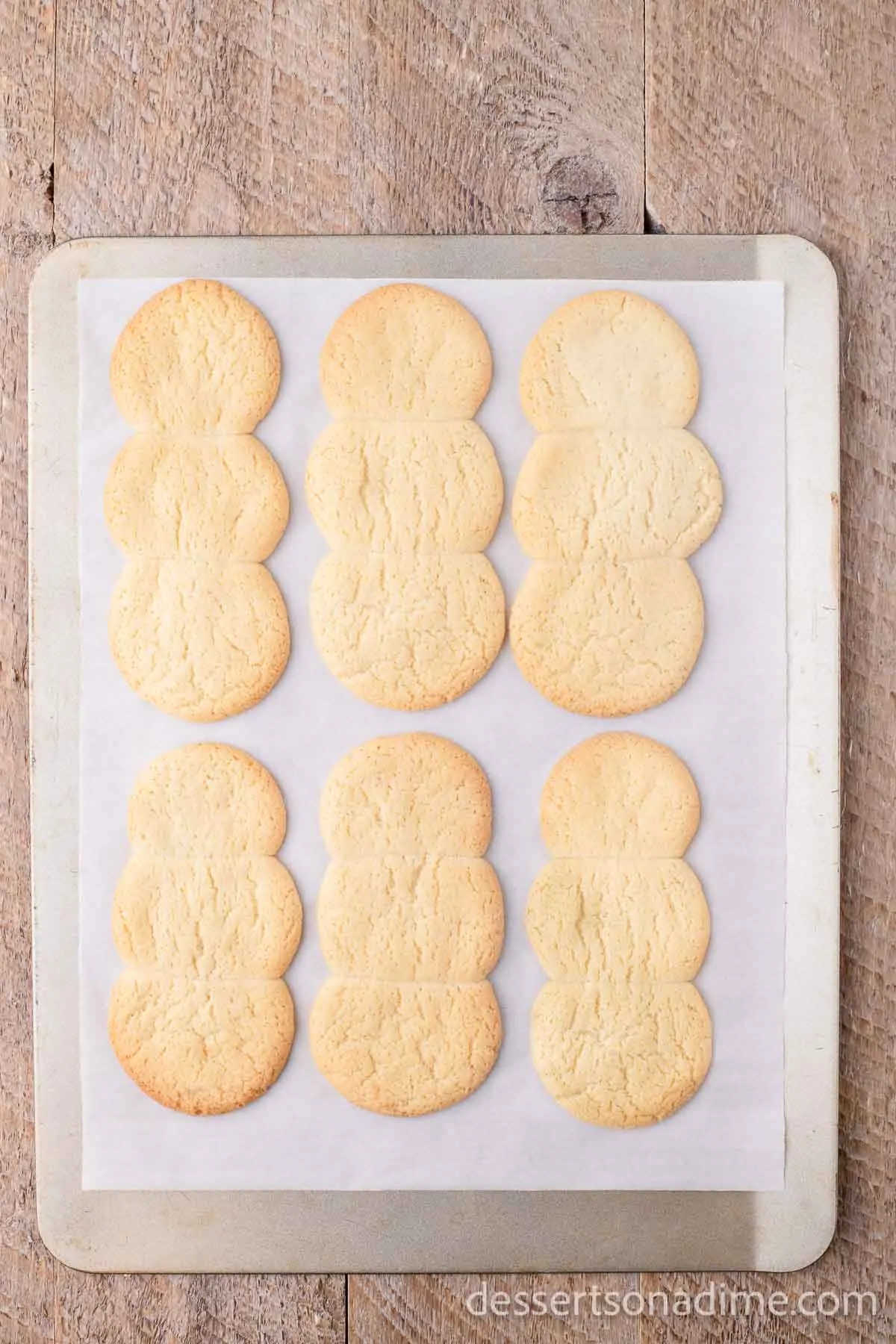 Cookies baked on cookie sheet. 