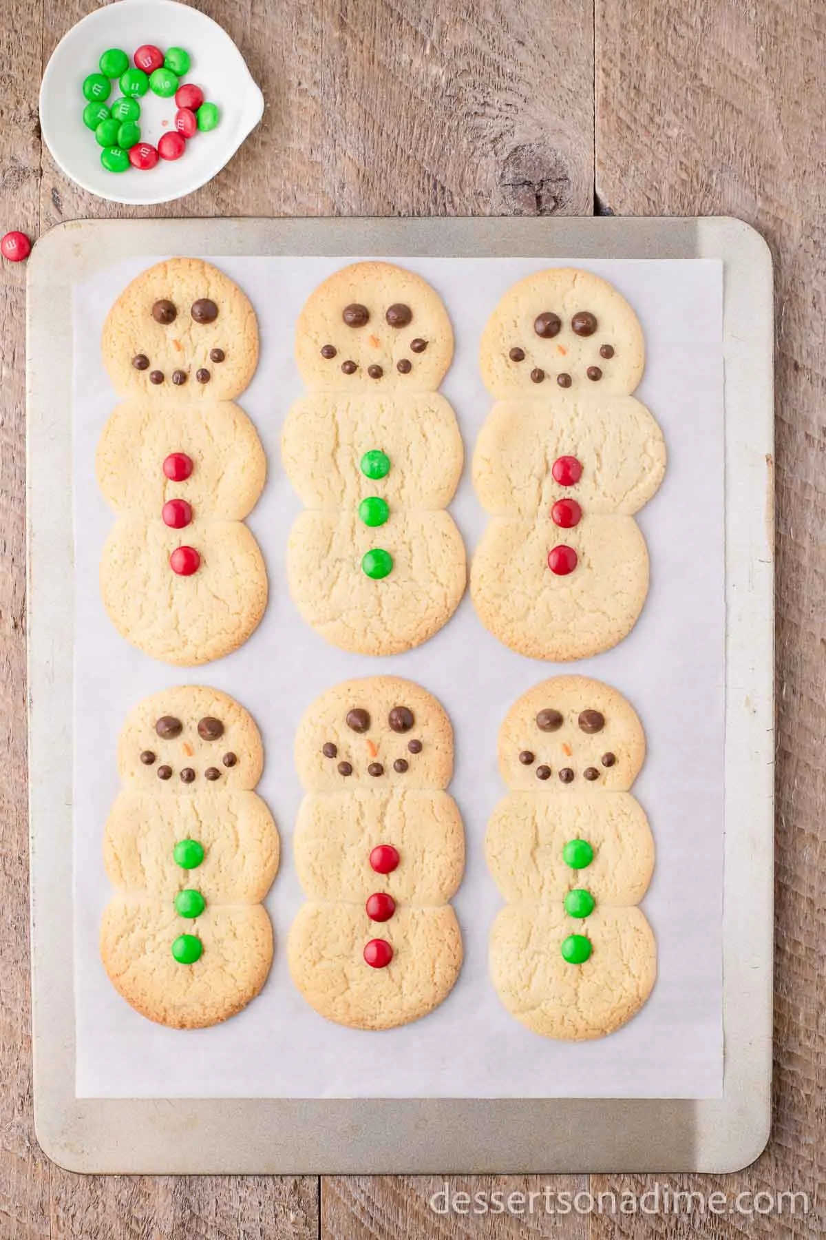 Cookies decorated with candy for buttons. 