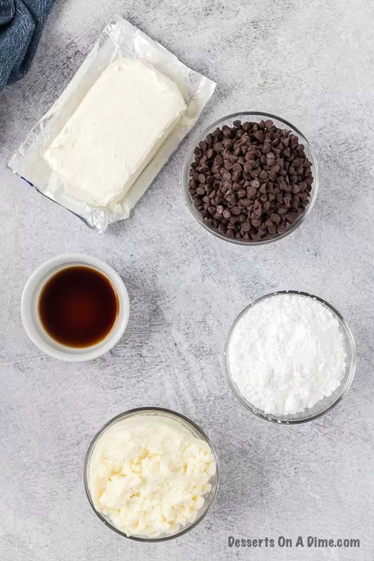 Ingredients for recipe - cream cheese, ricotta, powdered sugar, vanilla, mini chocolate chips. 