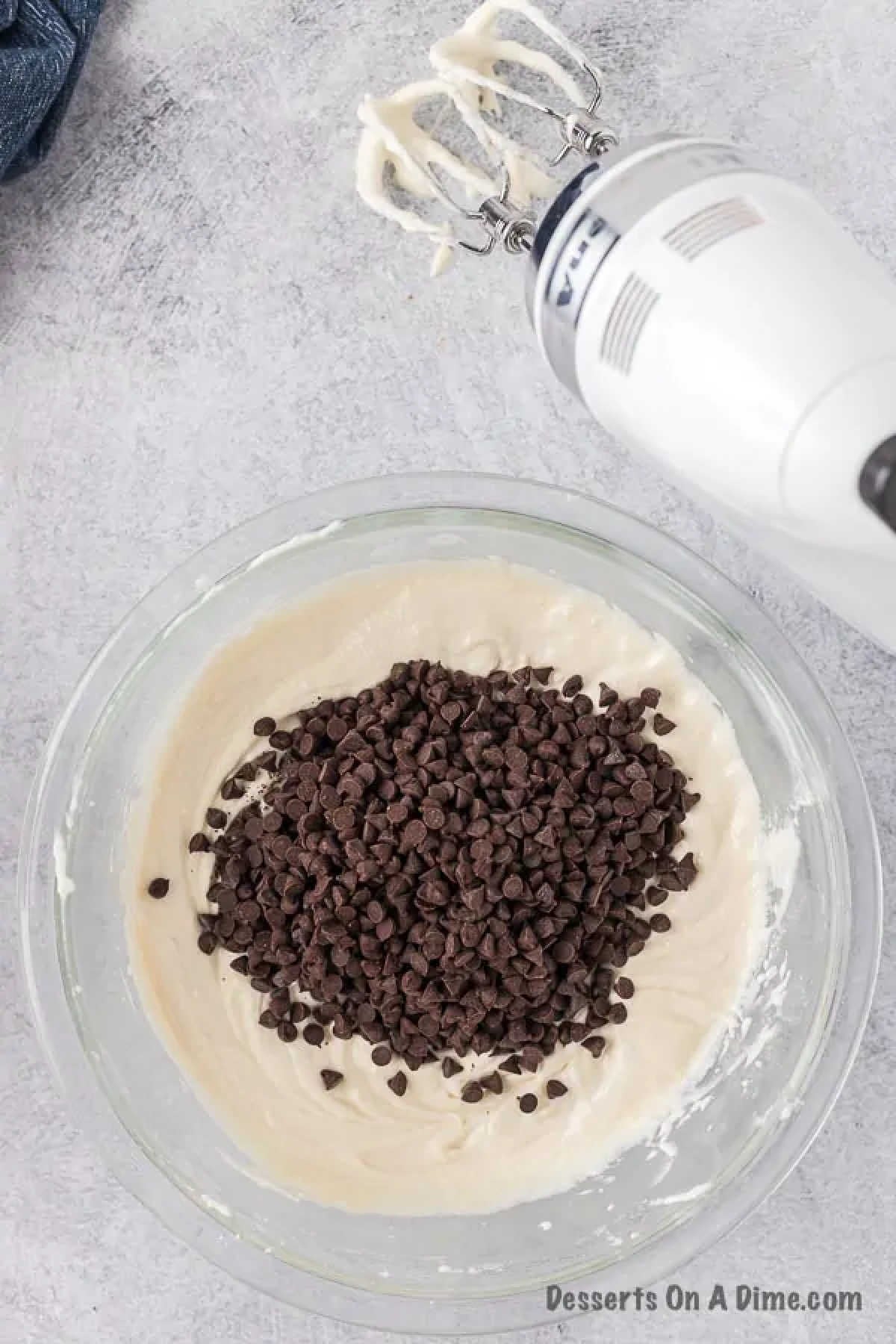 Chocolate chips folded into mixture. 