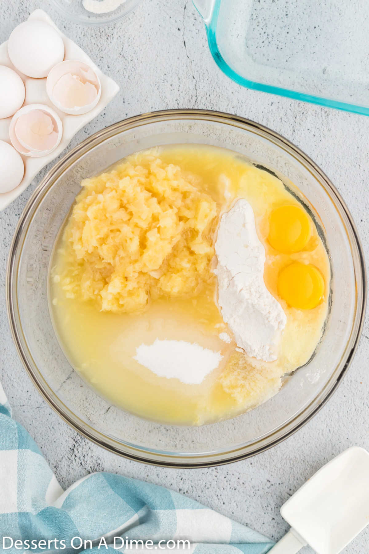Mixing bowl with cake ingredients being combined. 