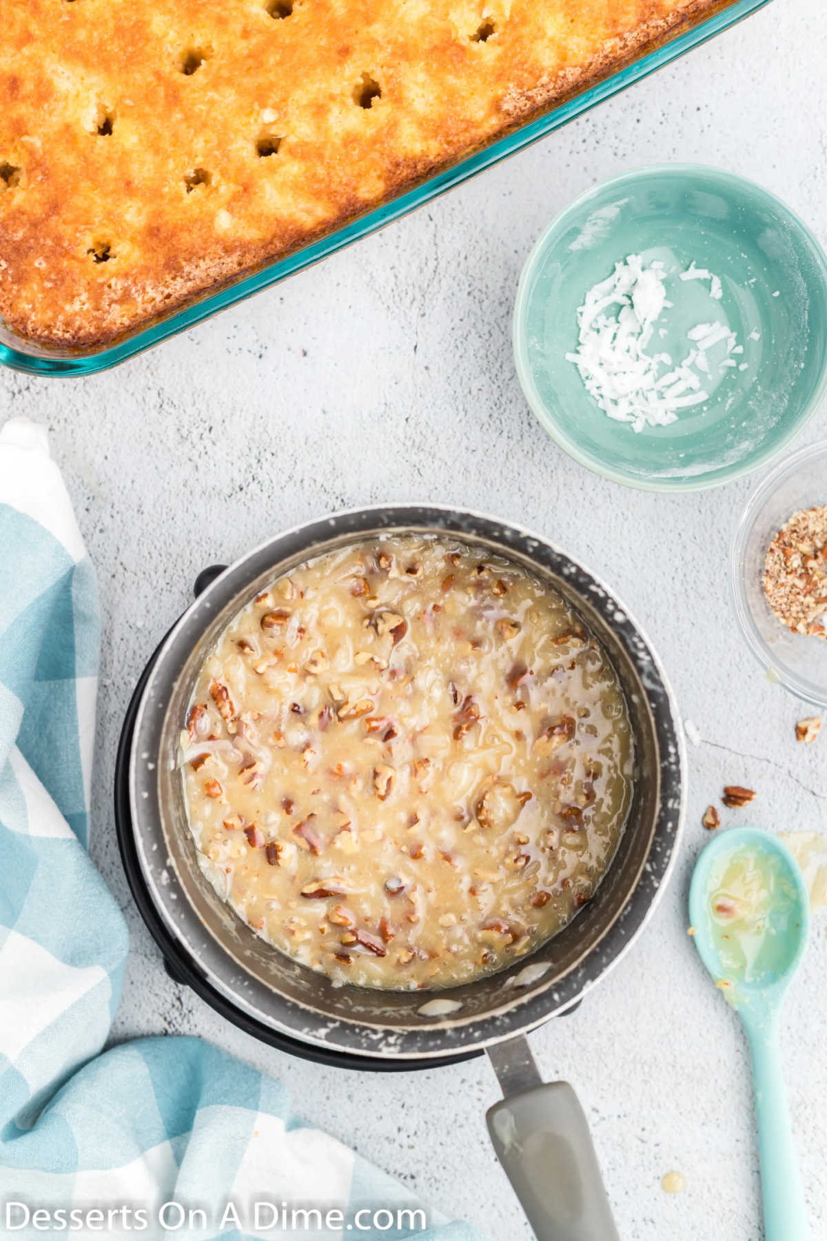 Saucepan with topping ingredients. 