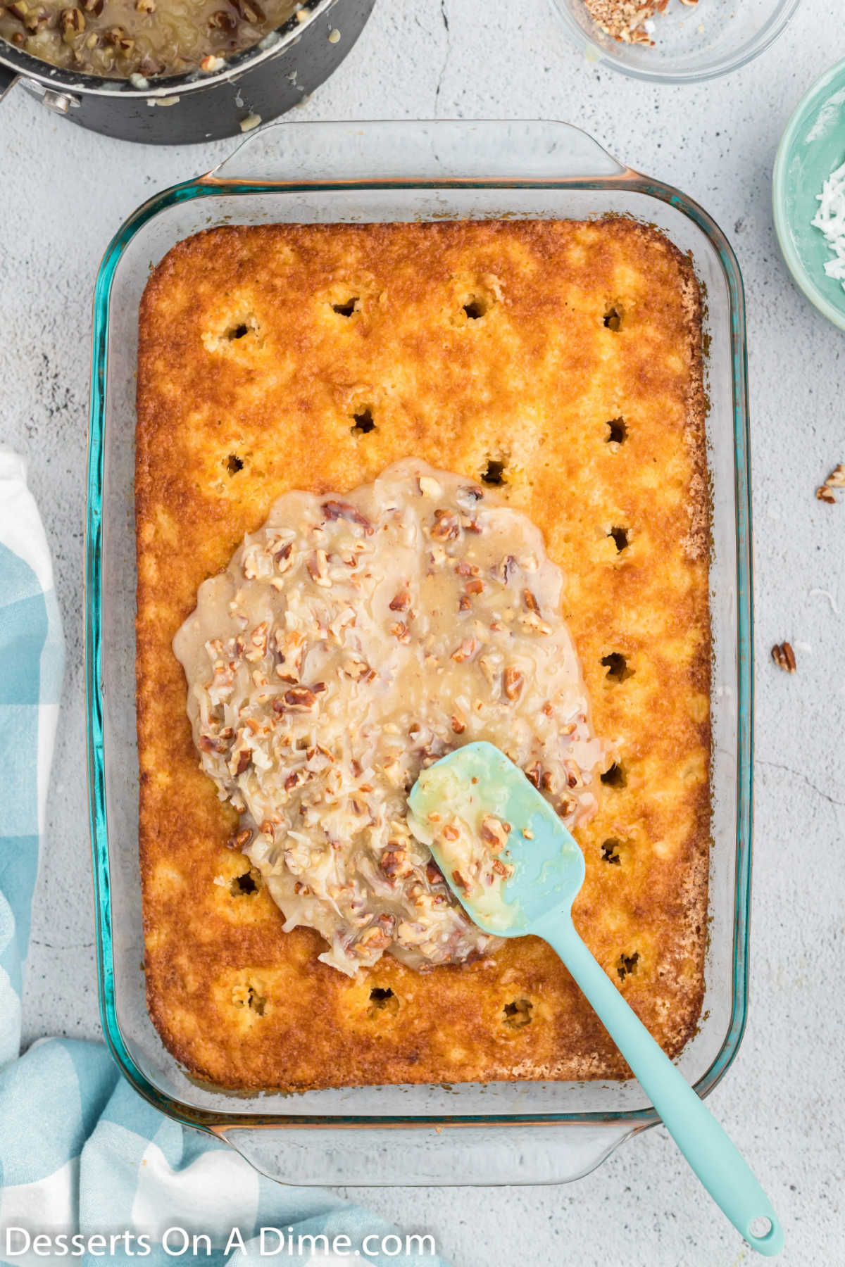 Mixture spread over cake. 