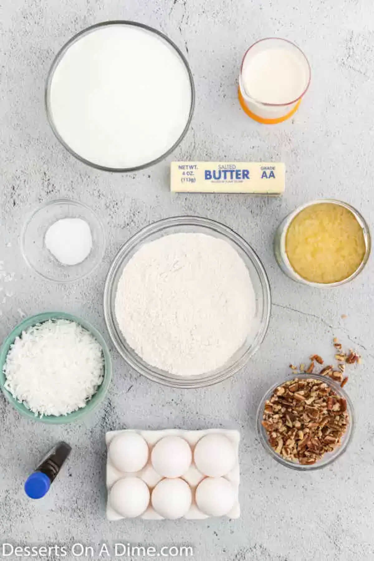 Ingredients for recipe: milk, sugar, pineapple, coconut, eggs, nuts, butter.