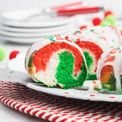 Christmas Bundt Cake sliced on a plate.