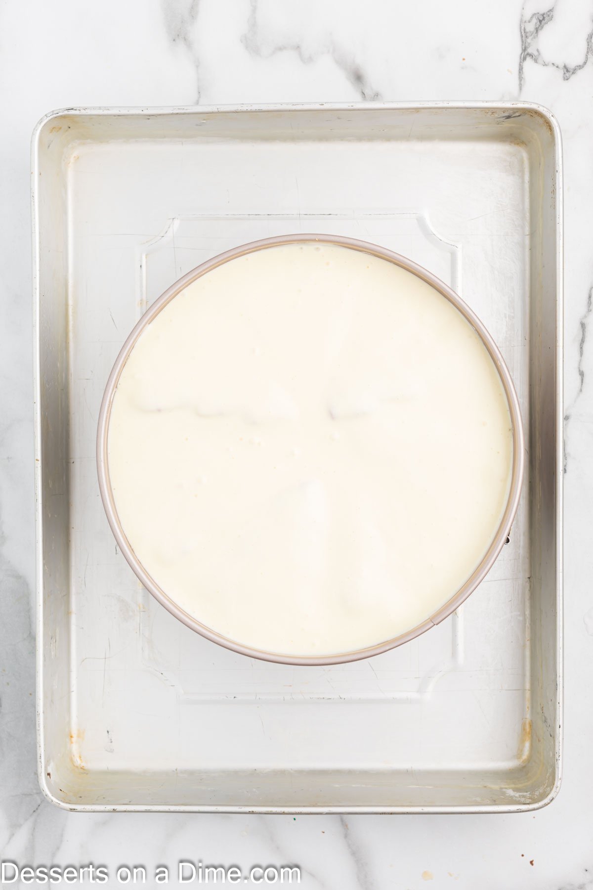 Remaining cheesecake batter poured over snack cakes. 