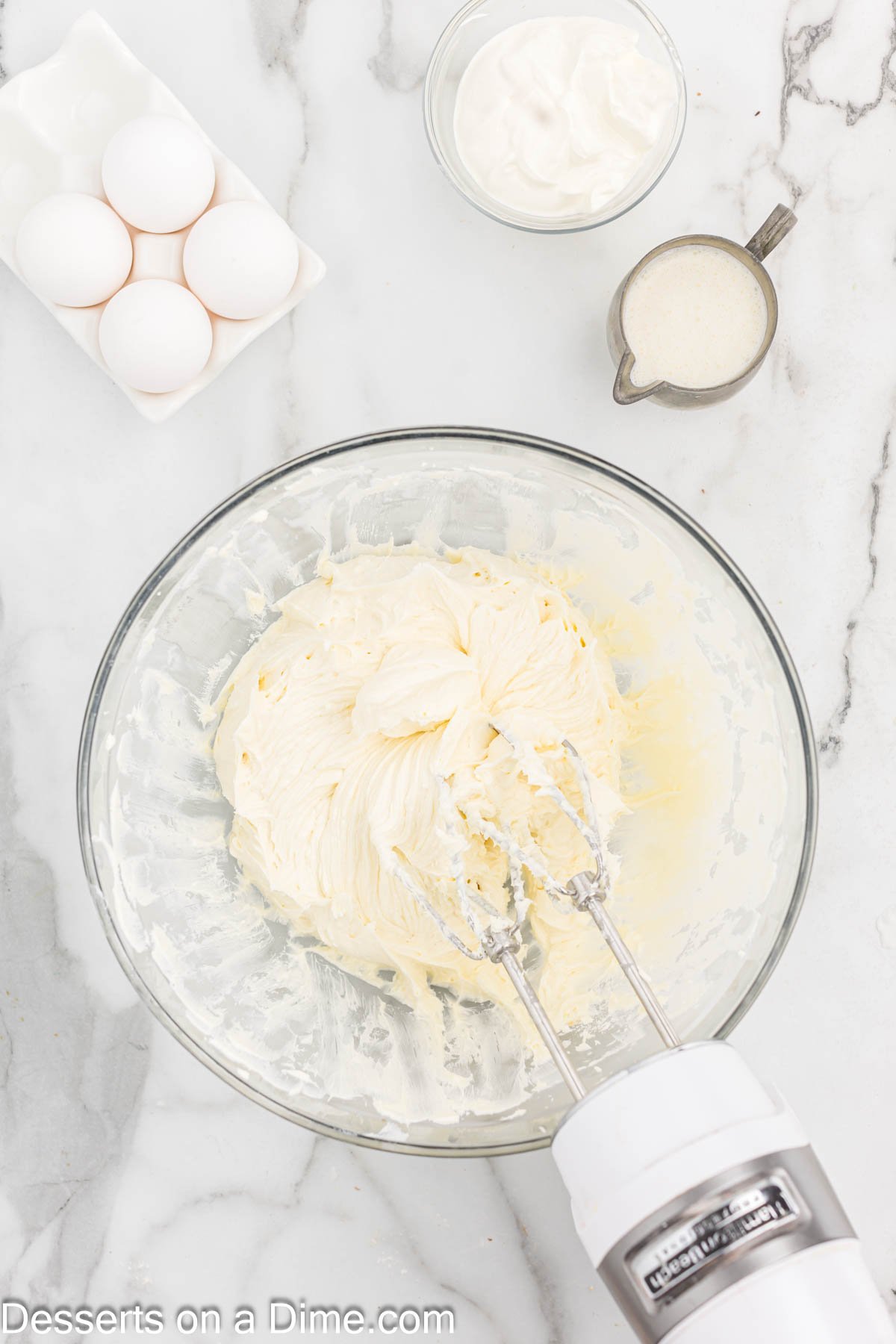 Vanilla and sugar added to cream cheese mixture. 