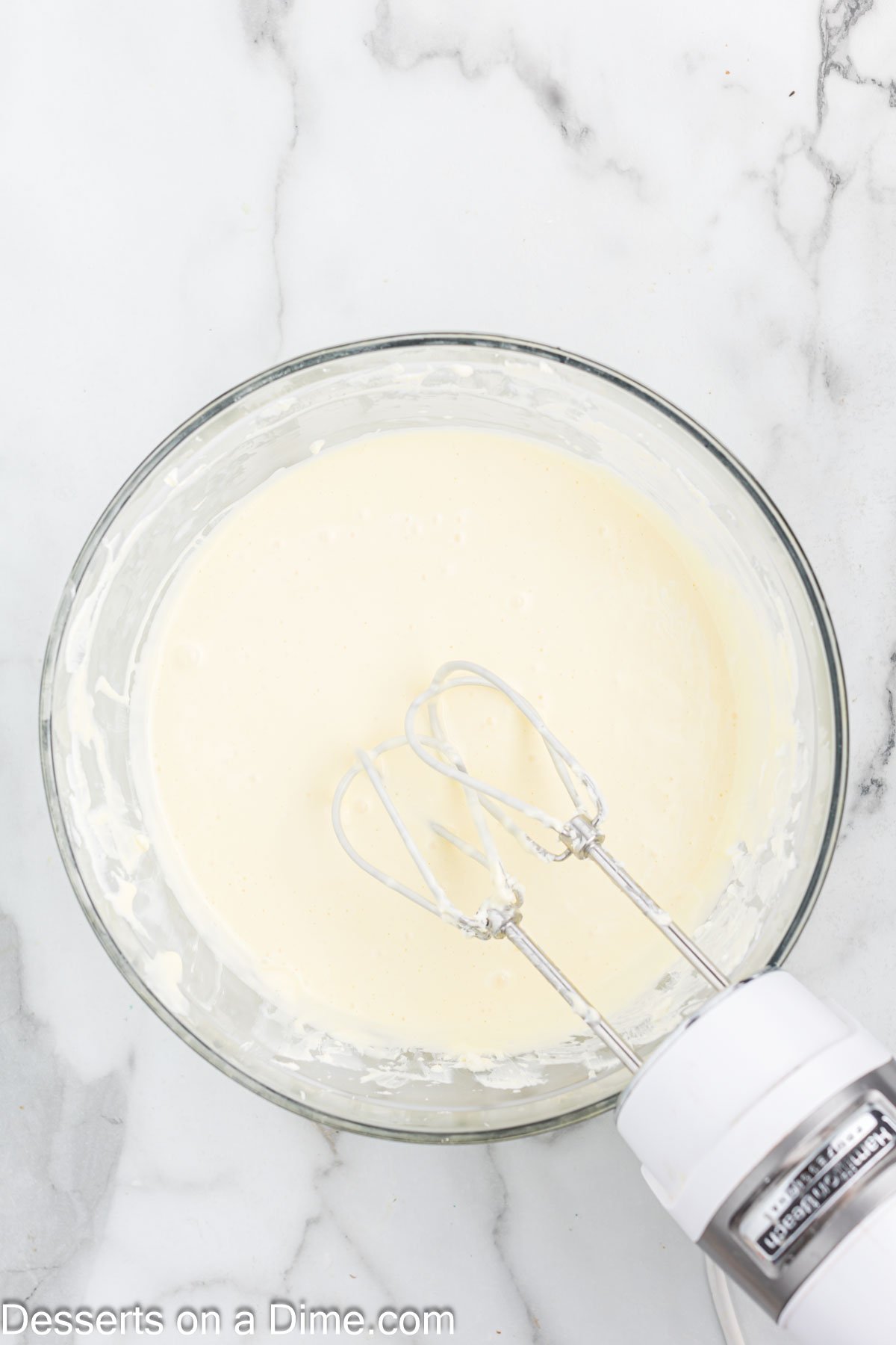 Sour cream combined into mixture. 