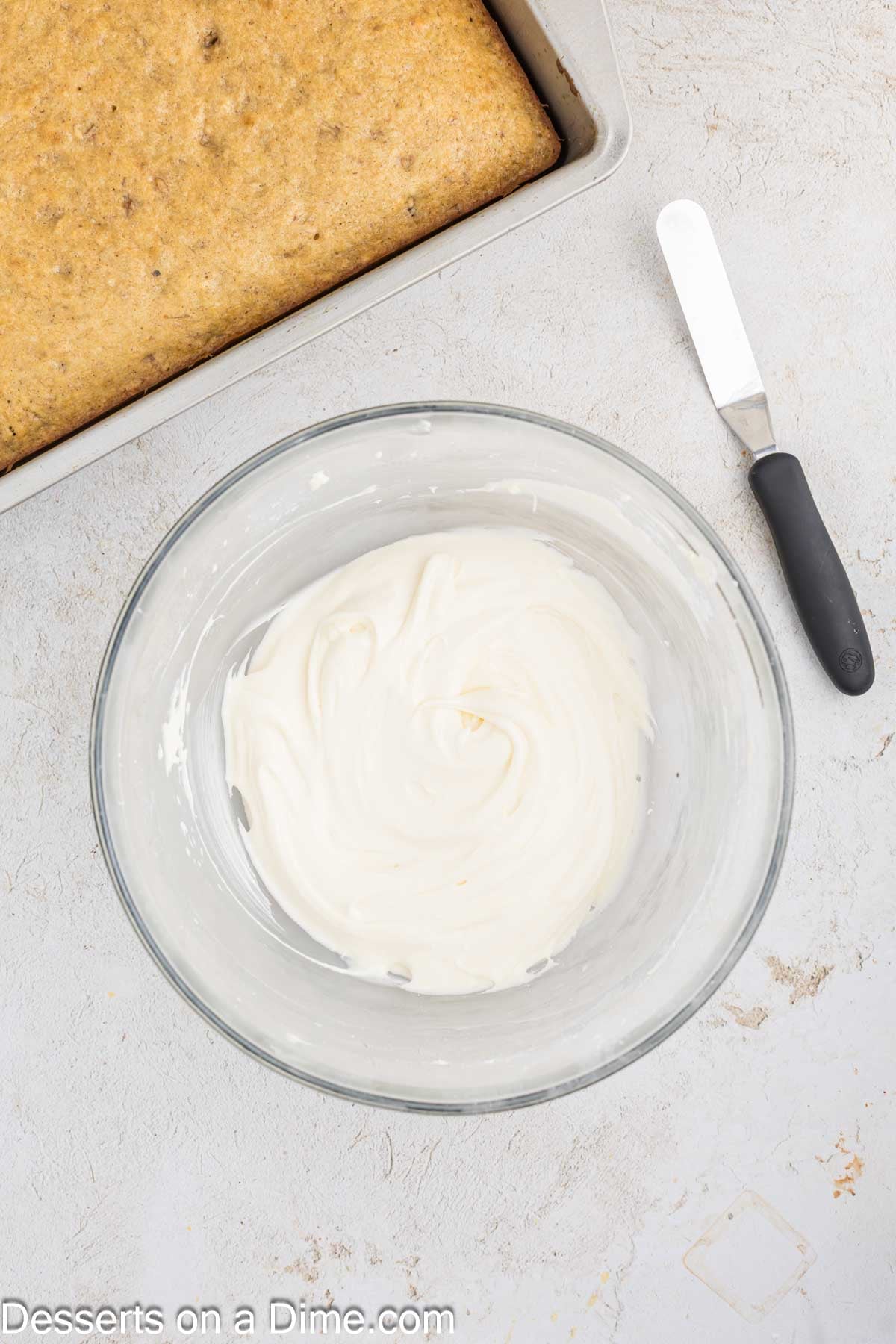 Powdered sugar mixed into cream cheese mixture.