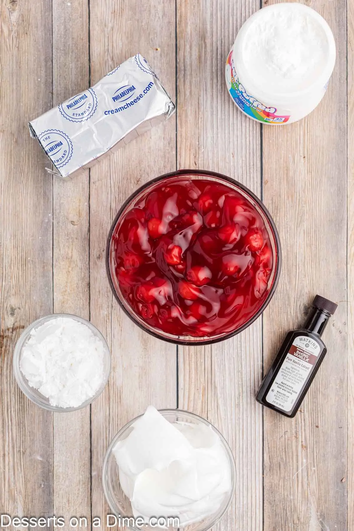 Ingredients for dip - cream cheese, powdered sugar, vanilla, marshmallow creme, whipped topping.