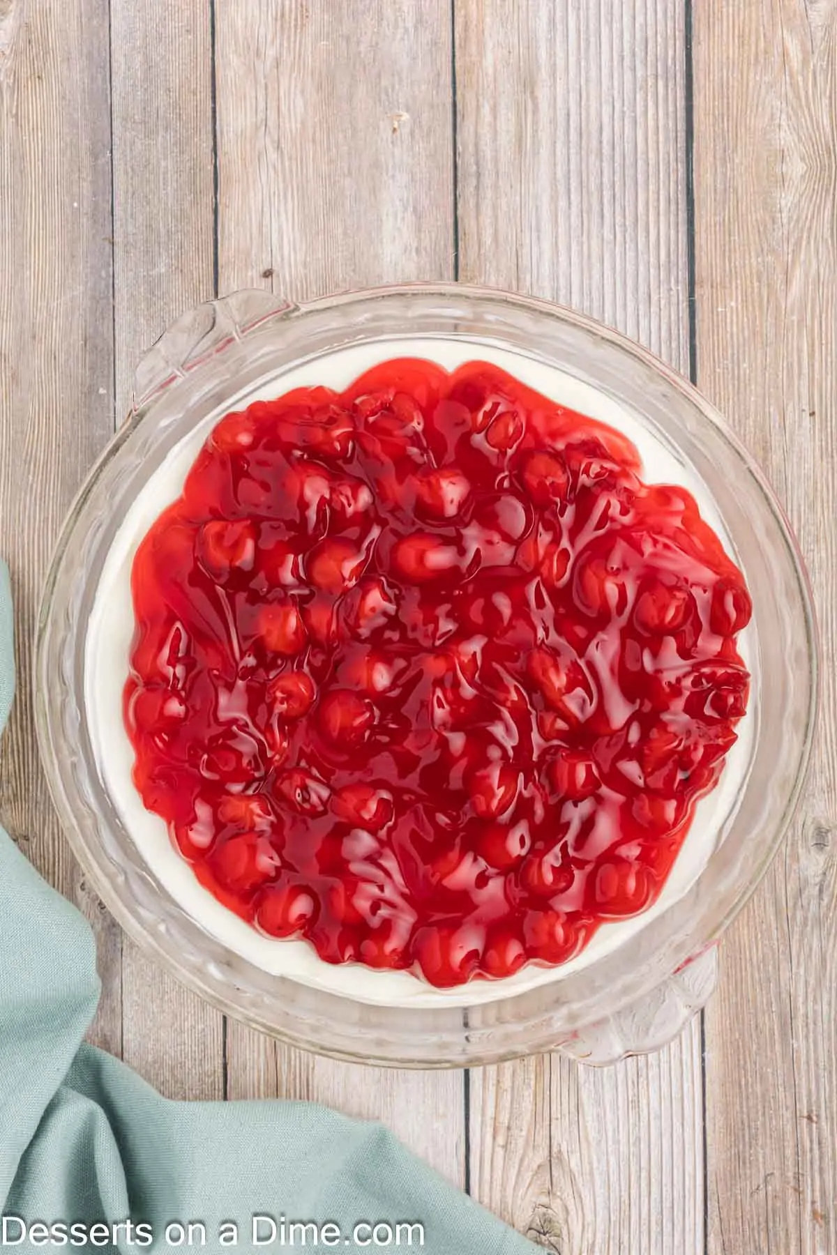 Cherry Pie Filling spread over cream cheese filling.