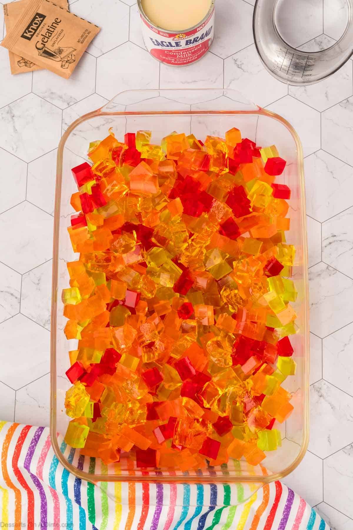 Cubes of jello in pan.