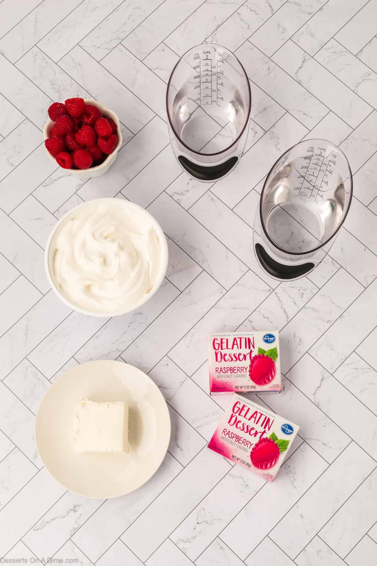 Ingredients for recipe - jello, cream cheese, cool whip, water.