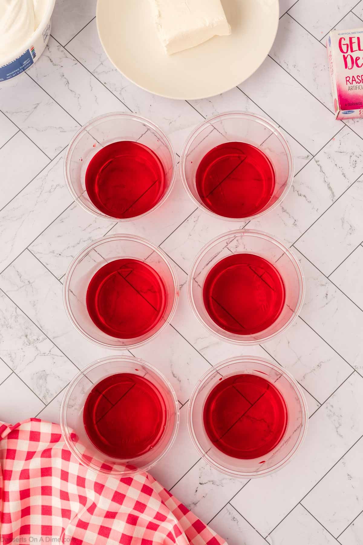 Jello divided into cups.