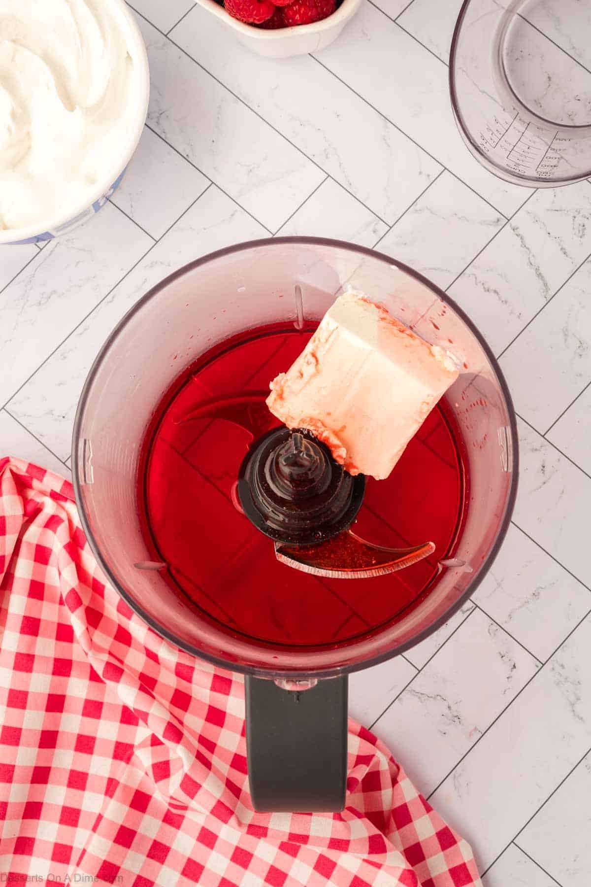 Cream cheese and jello in food processor.