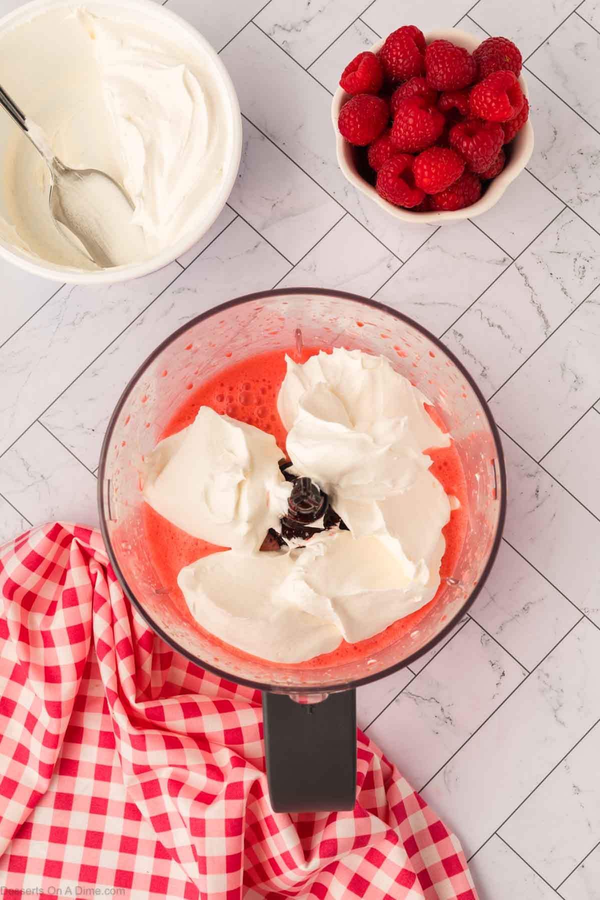 Whipped cream added to mixture.