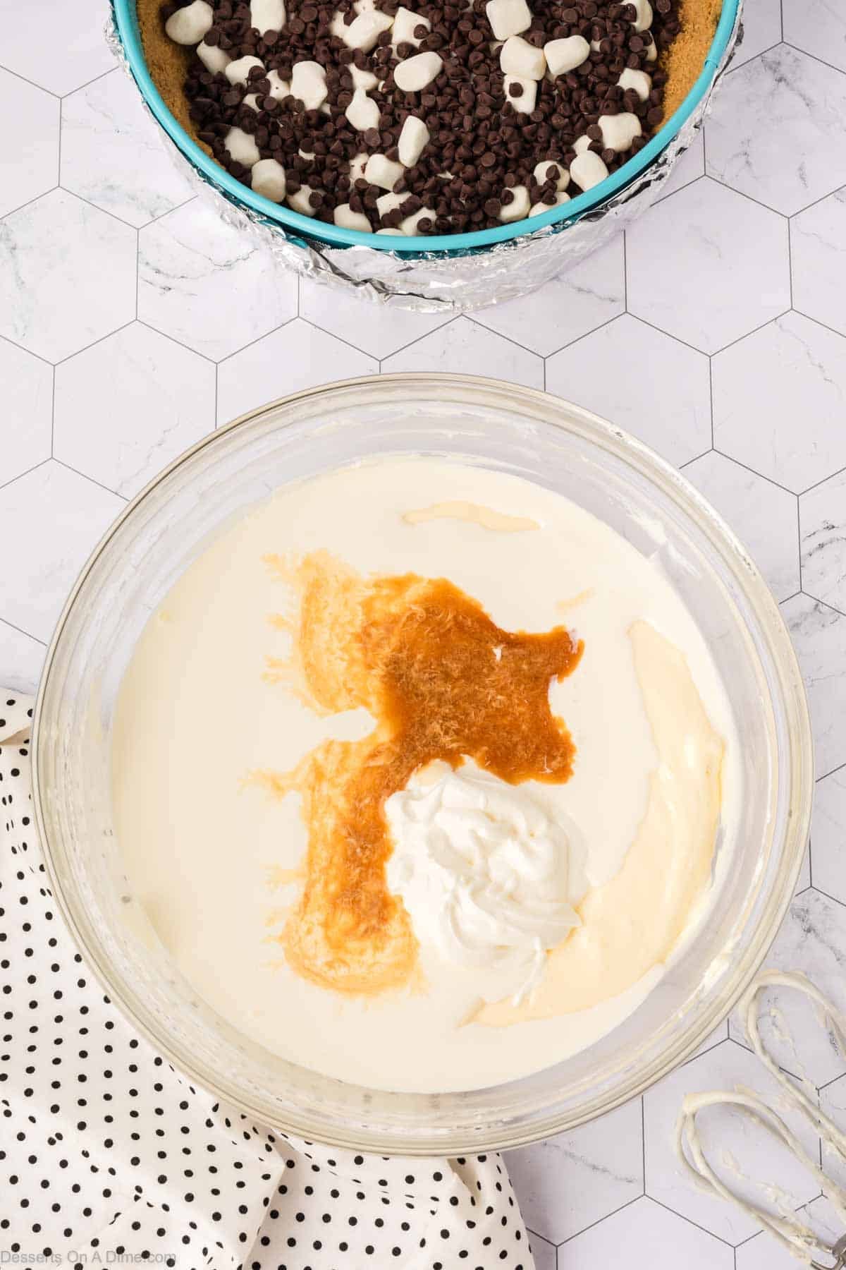 Vanilla, sour cream and eggs added to mixture.