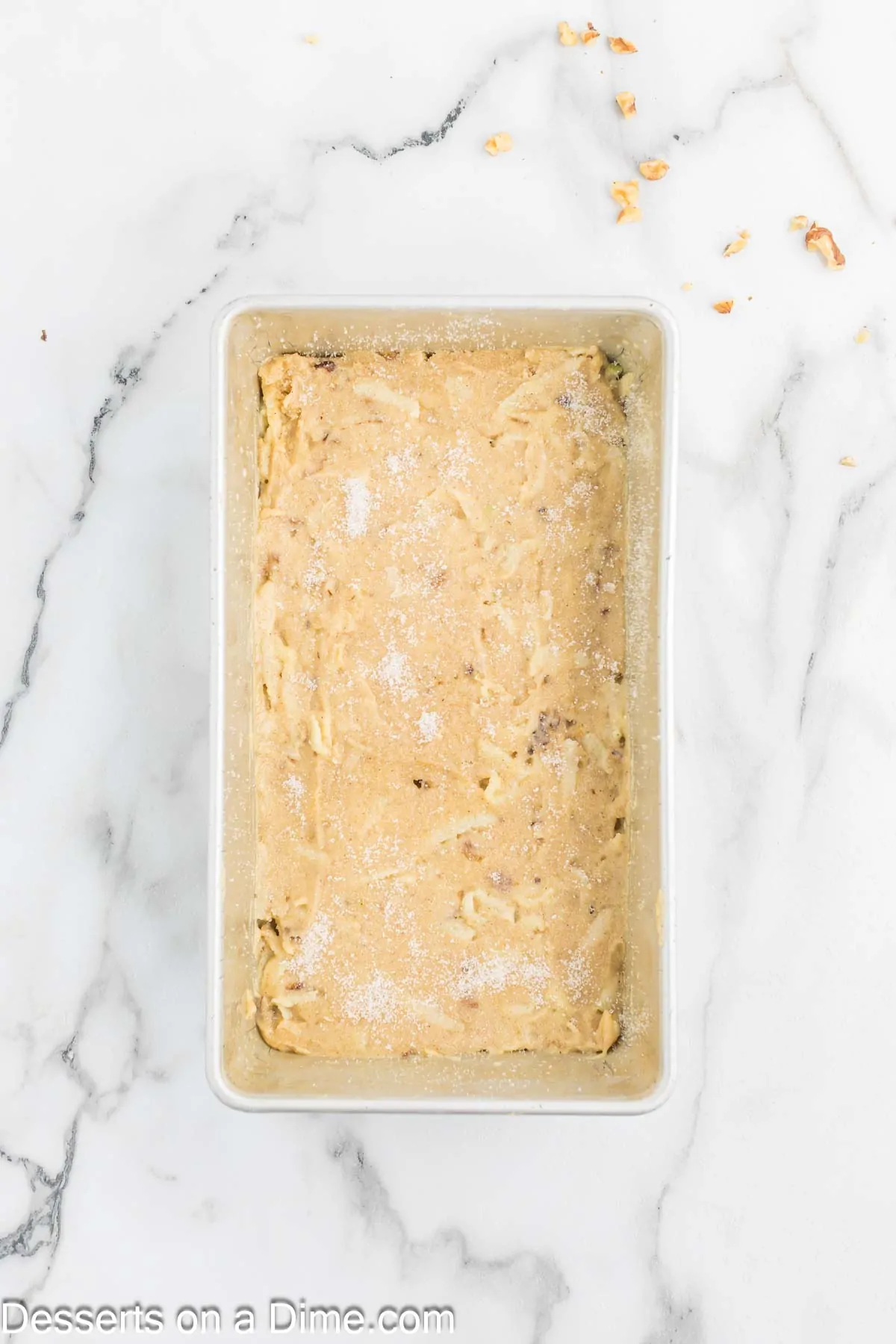 Batter spread into loaf pan.