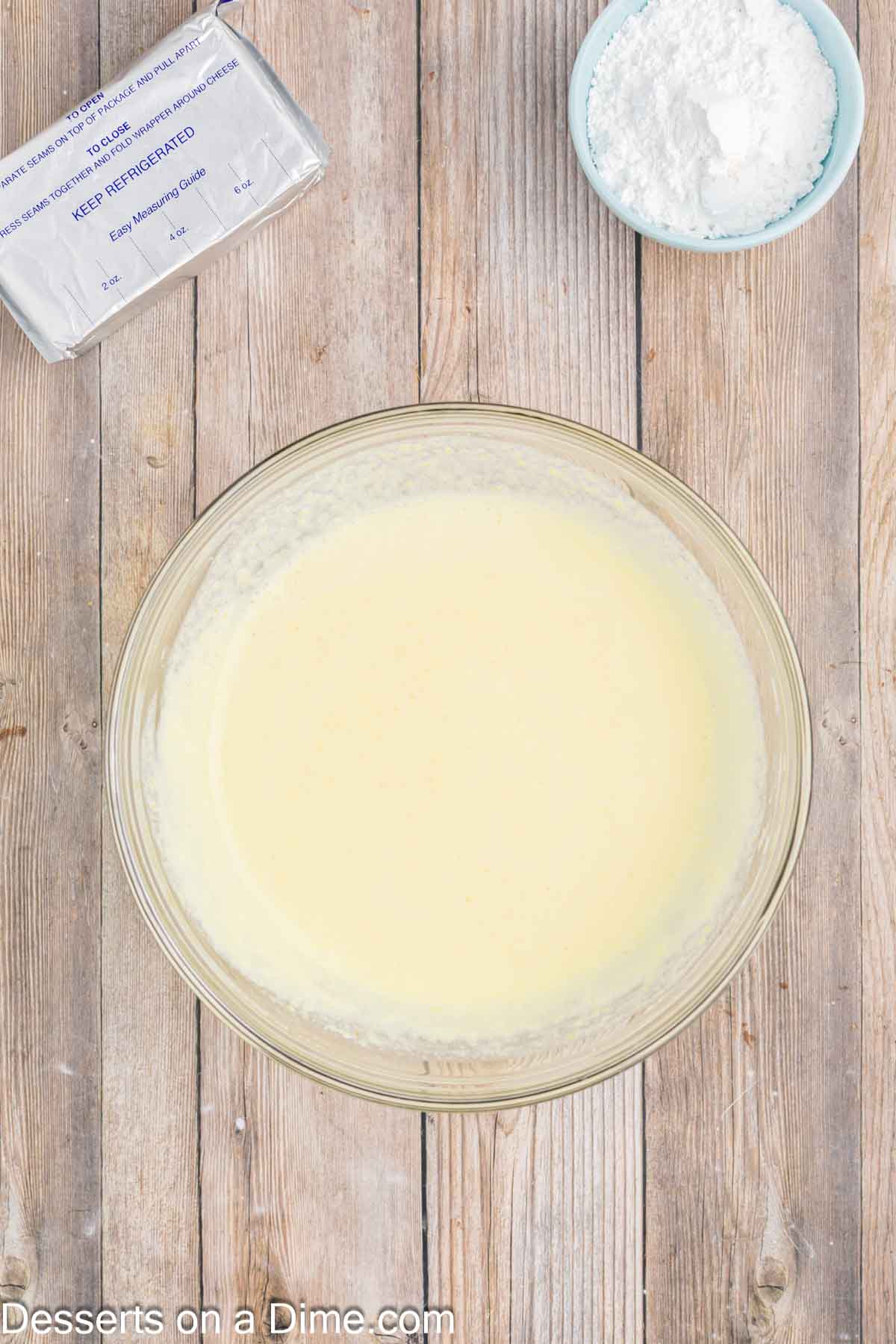 Lemon pudding mixture in a bowl.