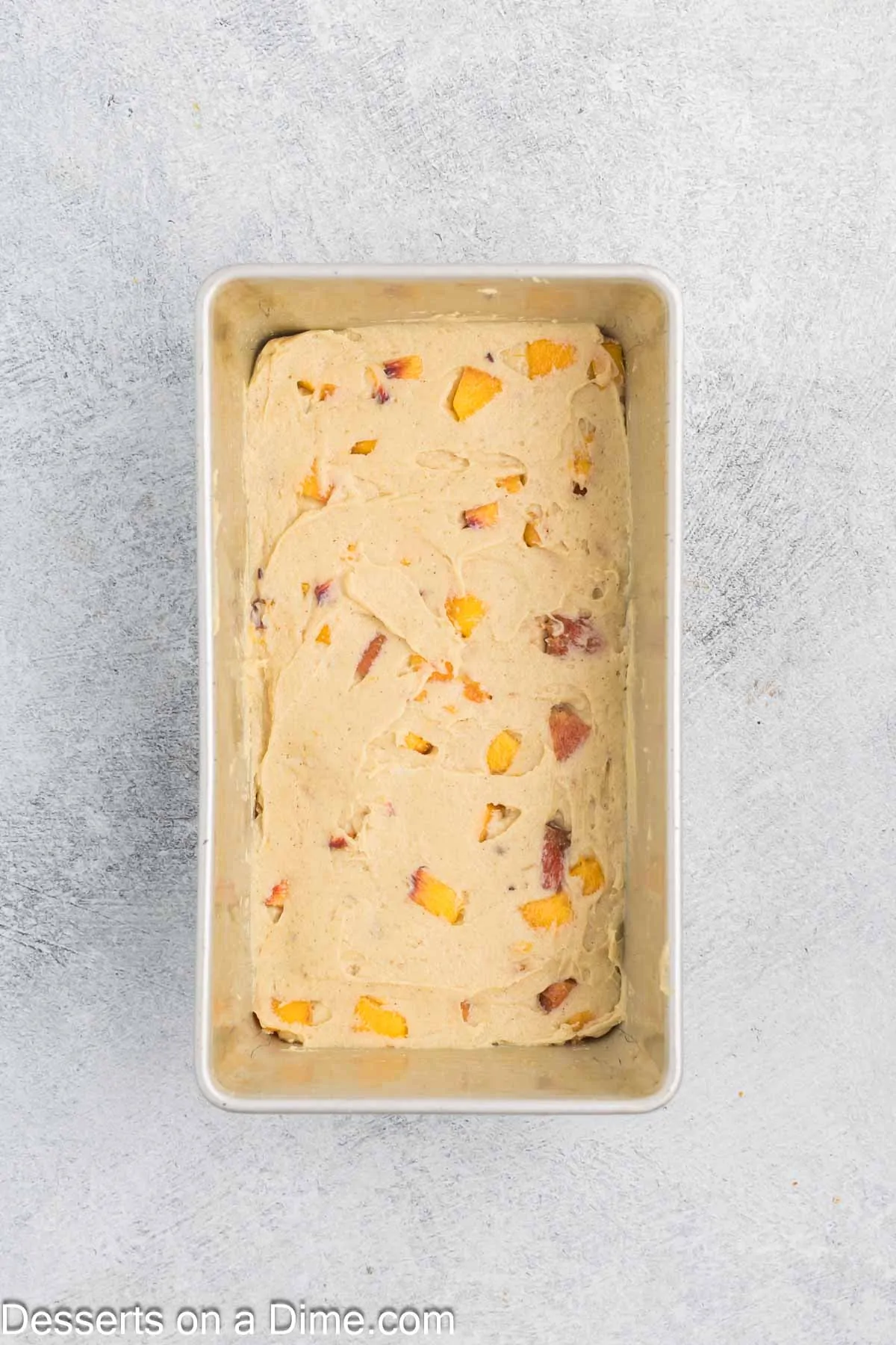 Batter spread into loaf pan.