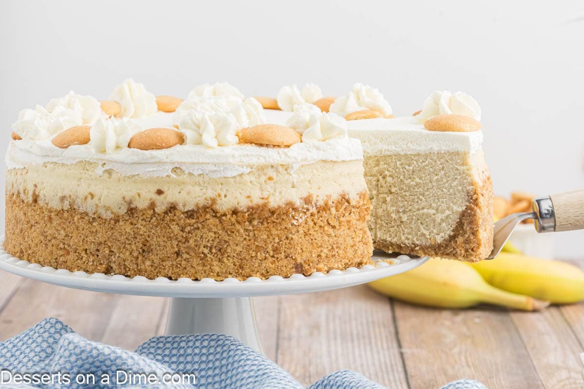 Banana Cream Cheesecake being sliced.