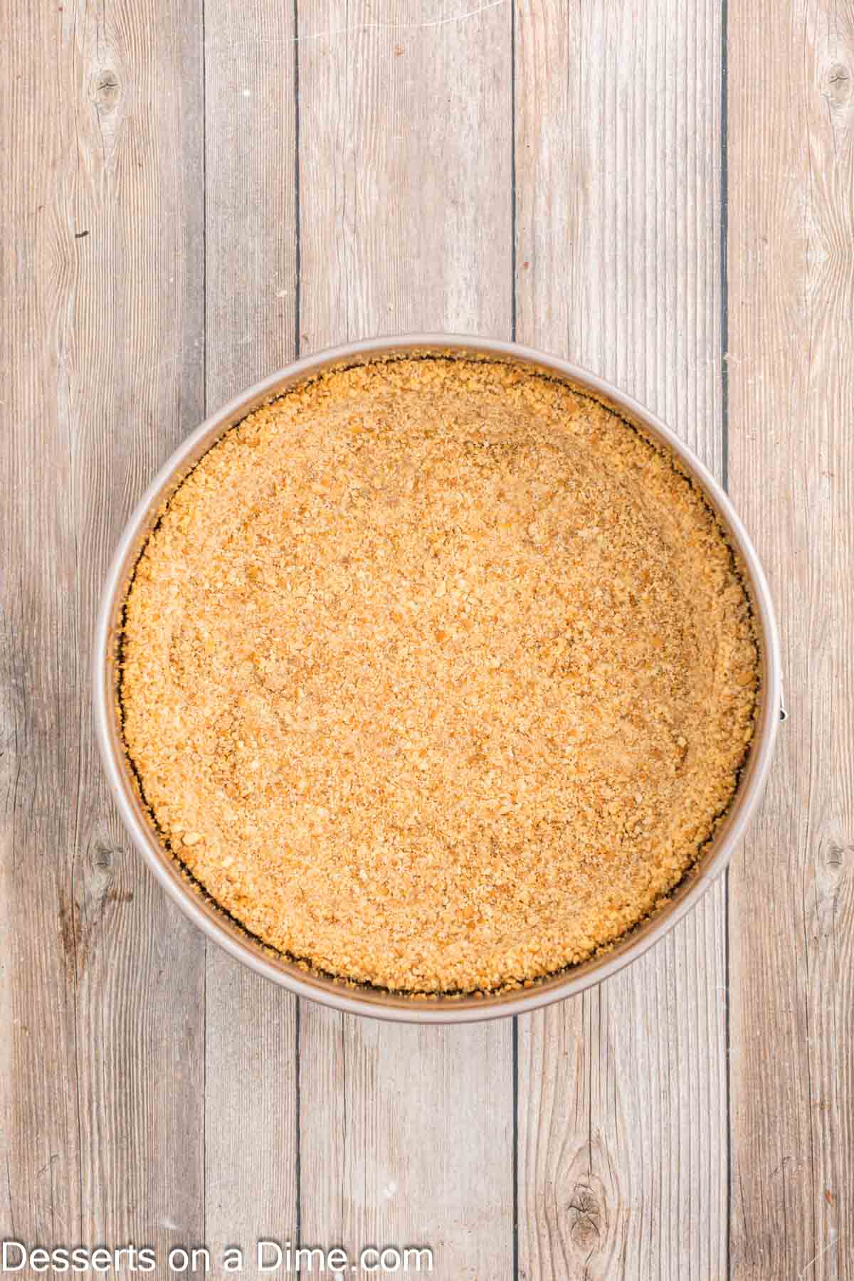 Crumbs pressed into pan and baked.