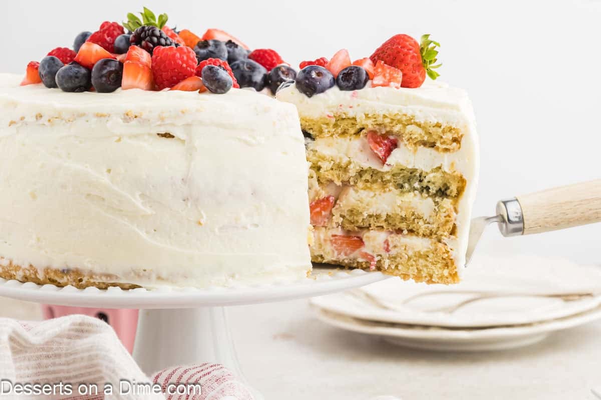Chantilly Cake being sliced.