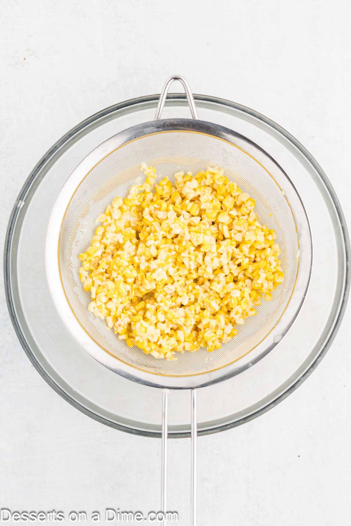 Corn in strainer.