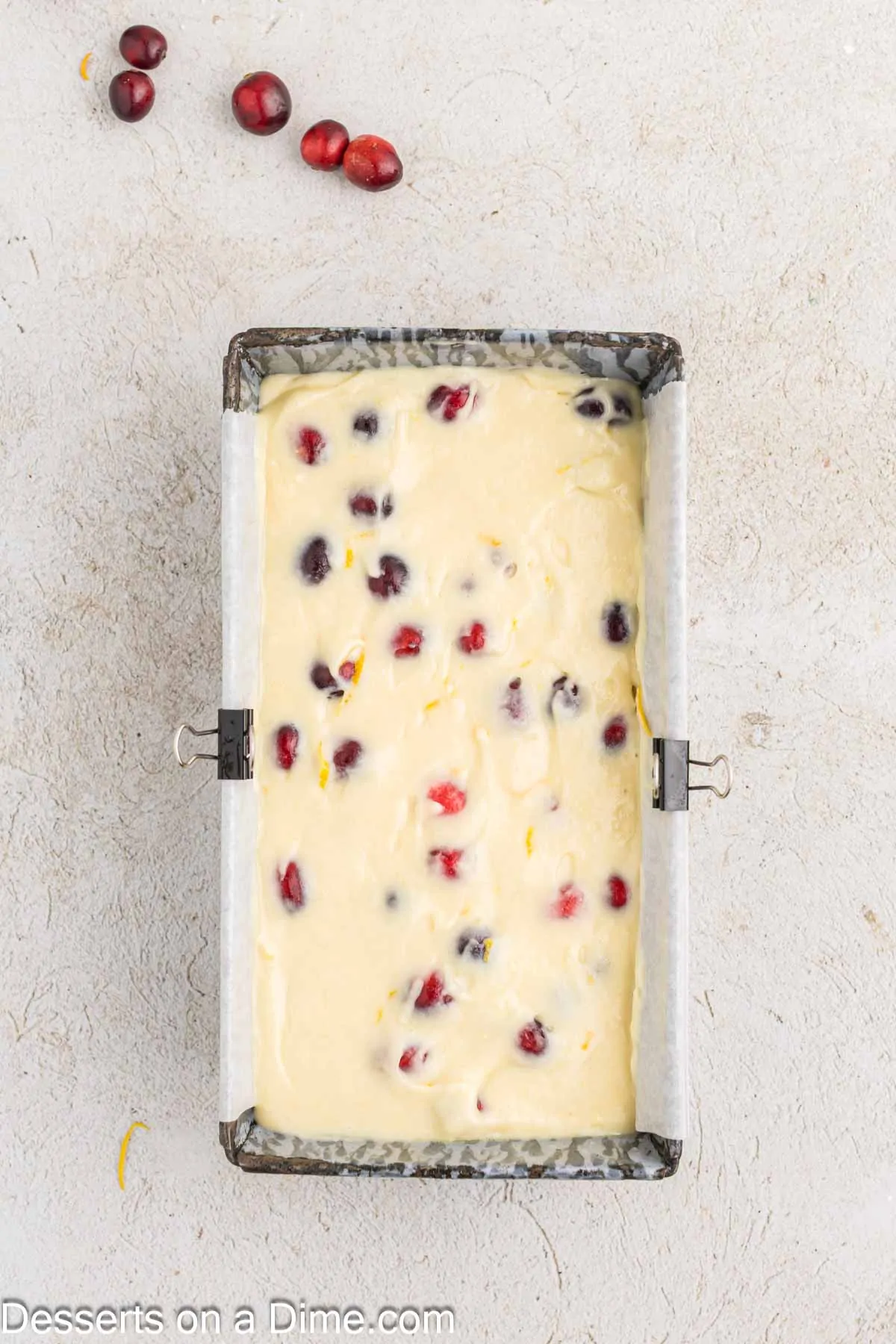 Batter with cranberries folded in and poured into loaf pan.