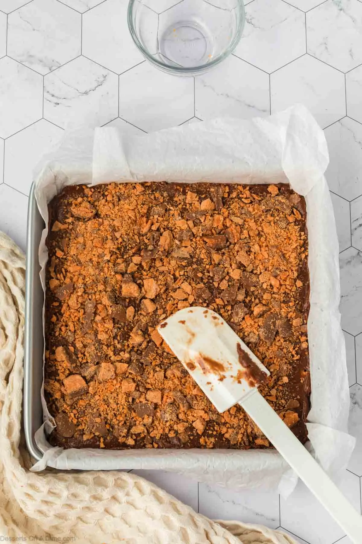 Butterfinger pieces sprinkled on top.